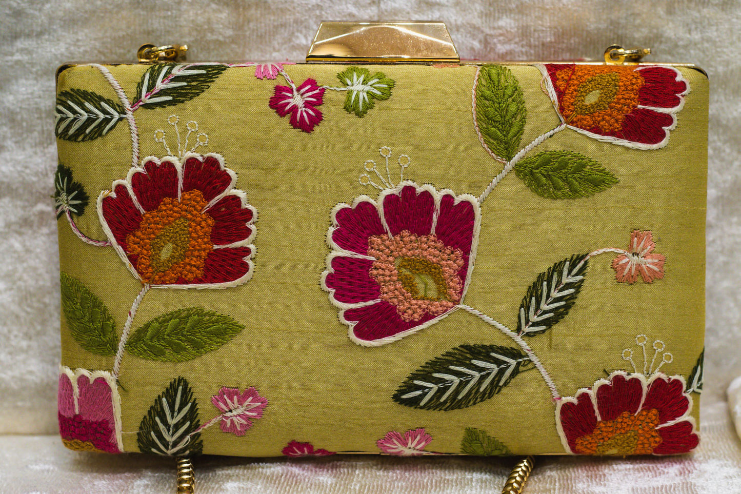 Light olive traditional handmade Banarasi brocade clutch bag with pink and orange floral embroidery.