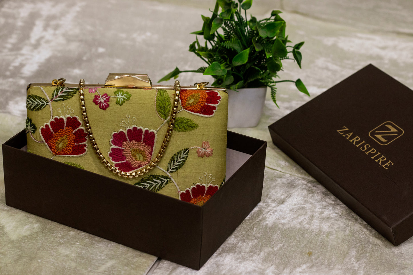 Light olive Banarasi brocade clutch bag with floral embroidery and gold chain, handmade traditional clutch.