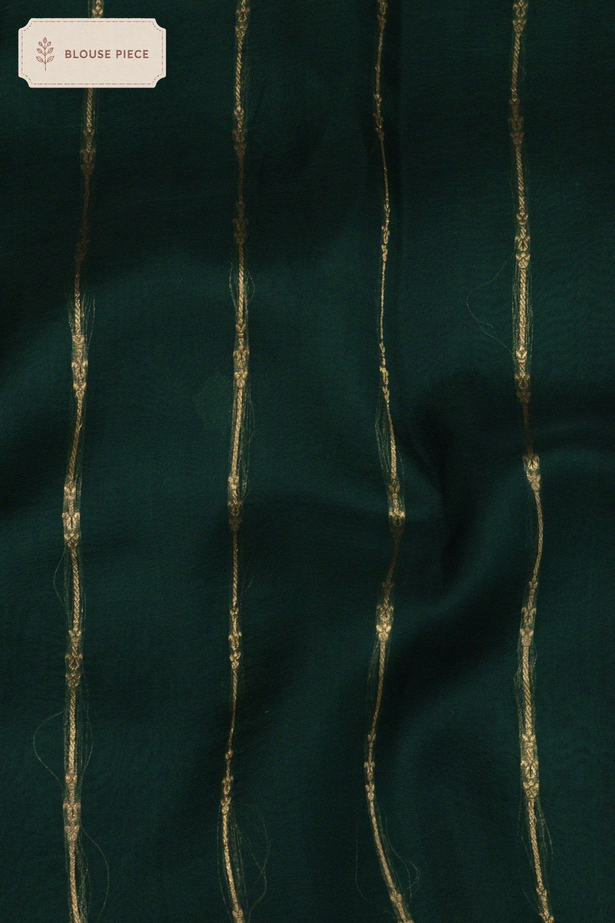 Pure Kora Organza Silk Bottle Green Banarasi Exquisitely adorned with intricate Kadhwa Gold Zari Butis and a - ZARISPIRE