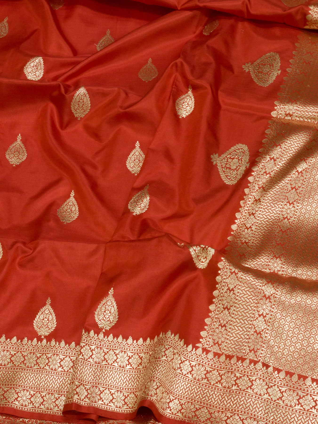 Pure Katan Silk Red Banarasi Exquisitely crafted with intricate Kadhwa Gold Zari Butis - close-up - ZARISPIRE