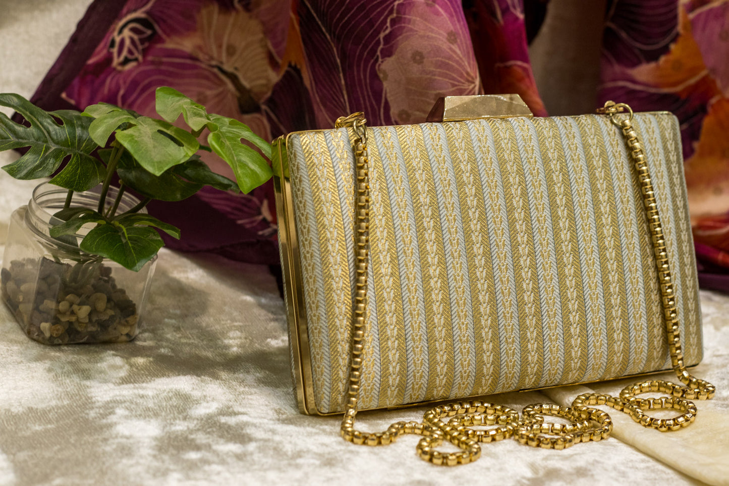 Sea blue Banarasi brocade clutch bag with gold chain, traditional handmade design, elegant pattern.