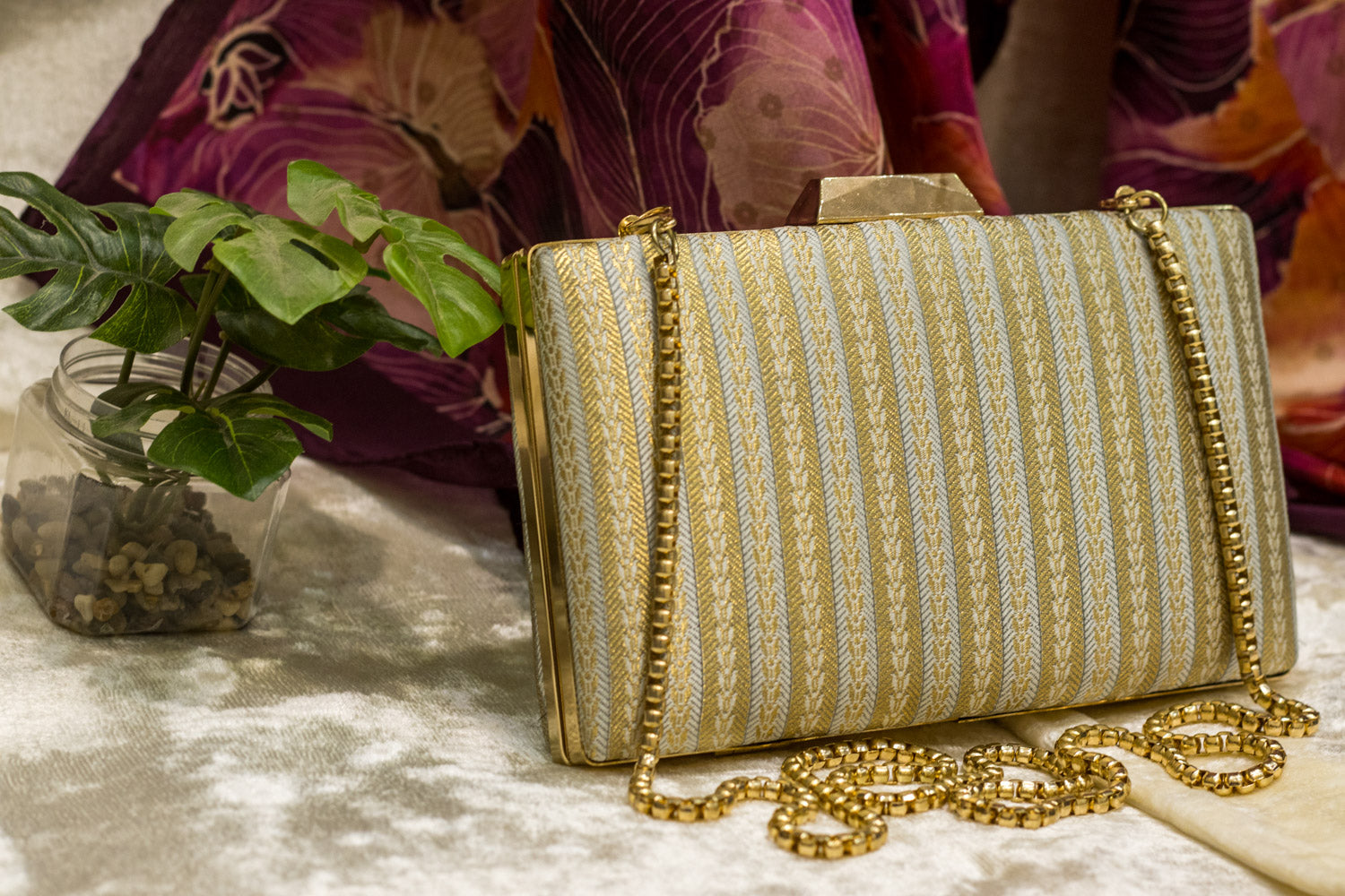Sea blue Banarasi brocade clutch bag with gold chain, traditional handmade design, elegant pattern.