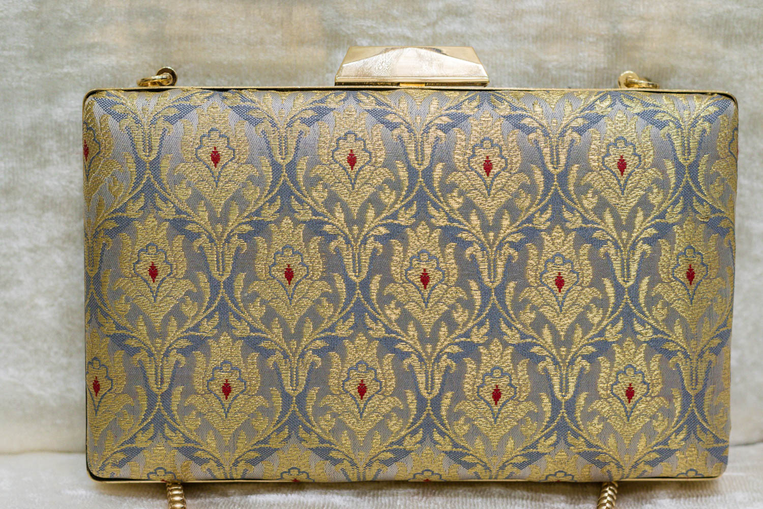 Steel blue Banarasi brocade clutch bag with traditional floral motifs, handmade elegance.