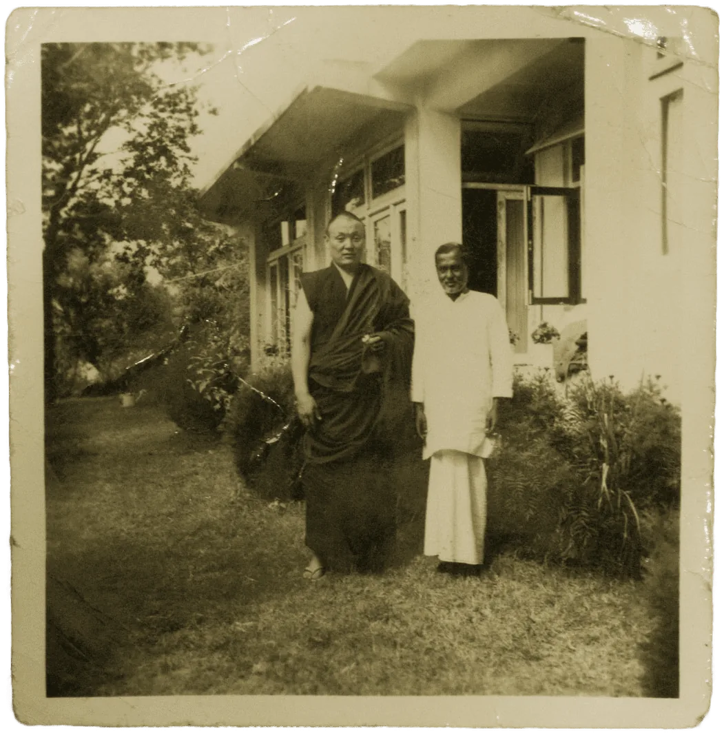 Haji Mohammad Yamin Girast with a customer from Tibet